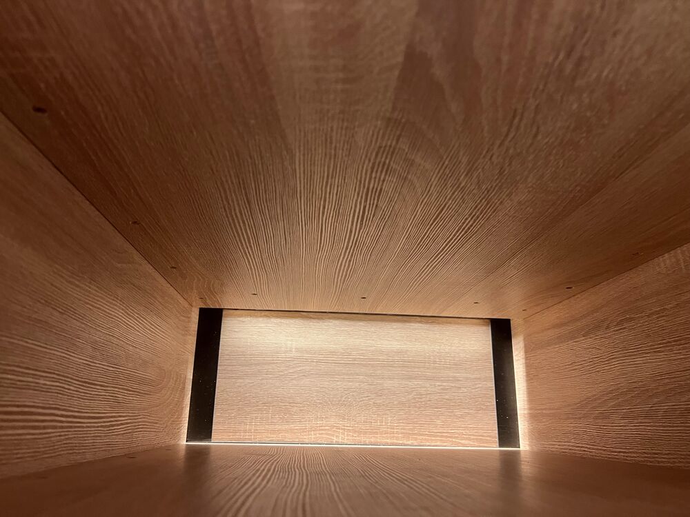 Inside of an unfinished wooden box